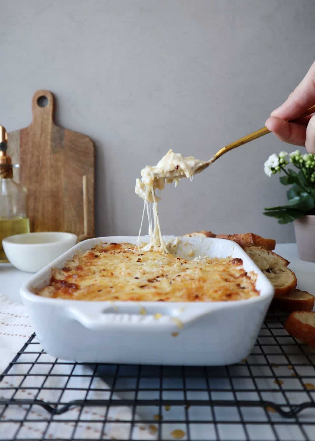 Cheesy Artichoke Dip with Hot Honey Drizzle
