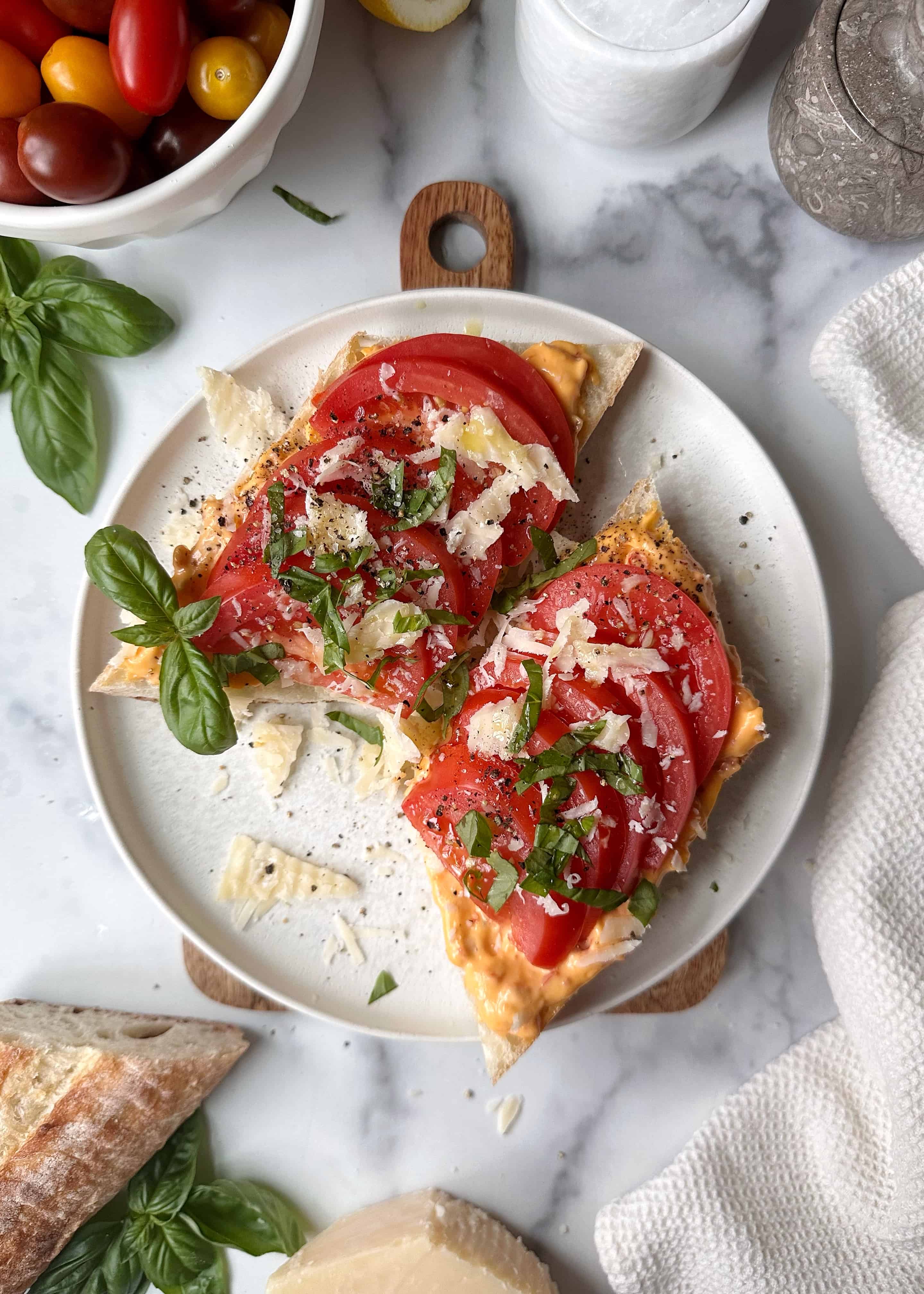 spicy tomato toast with parmesan and basil