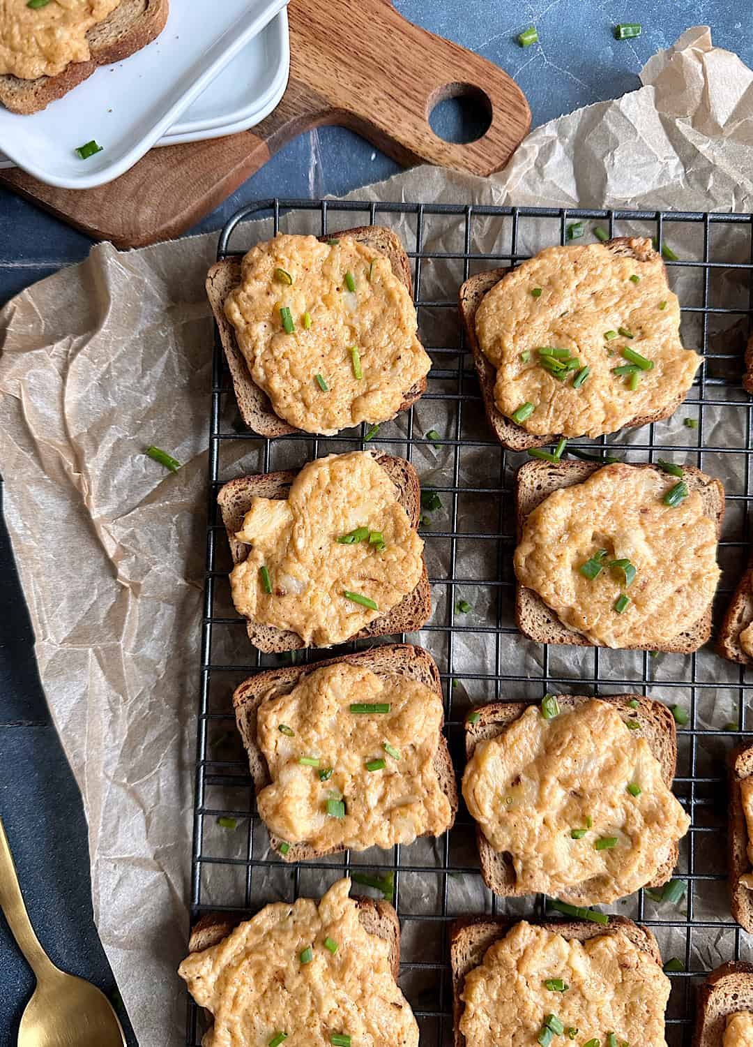 cheesy crab toasts on cooling rack
