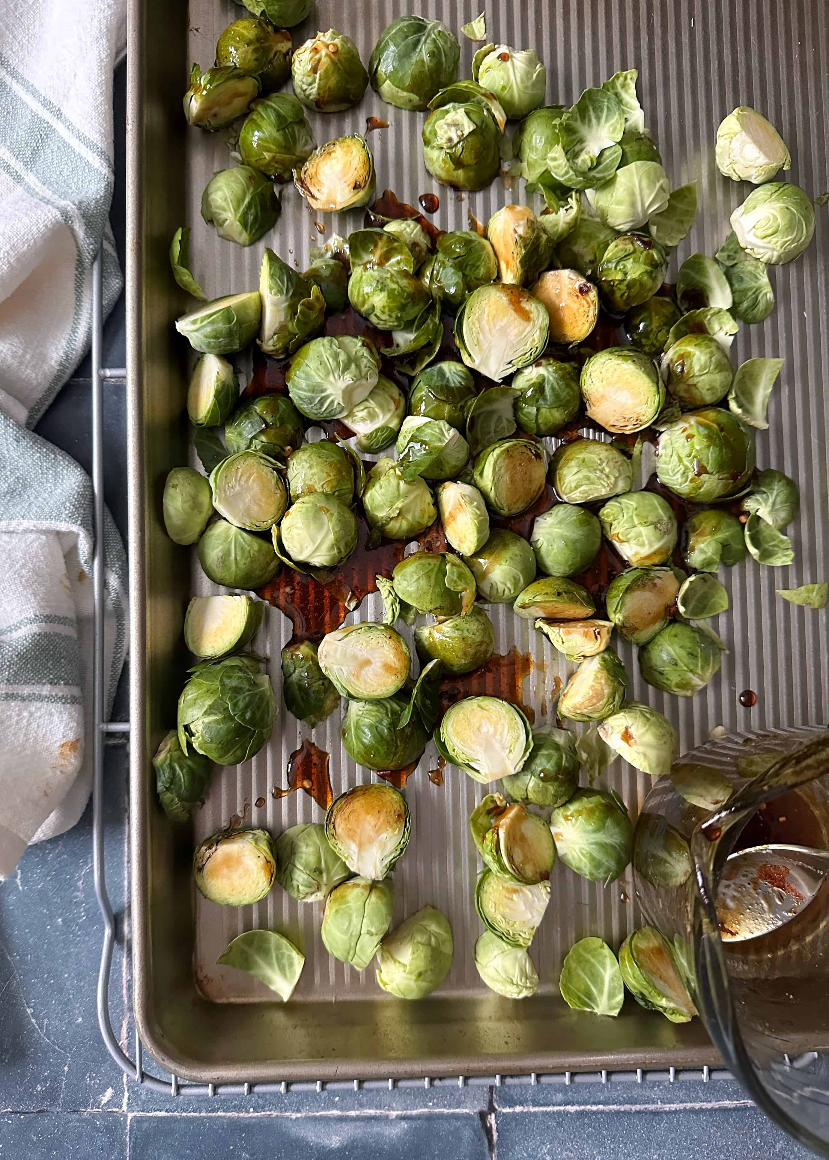 chili maple balsamic brussels sprouts before roasting