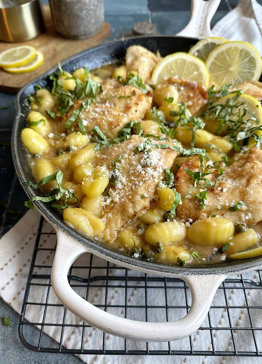 one pot chicken piccata in cast iron skillet with lemon