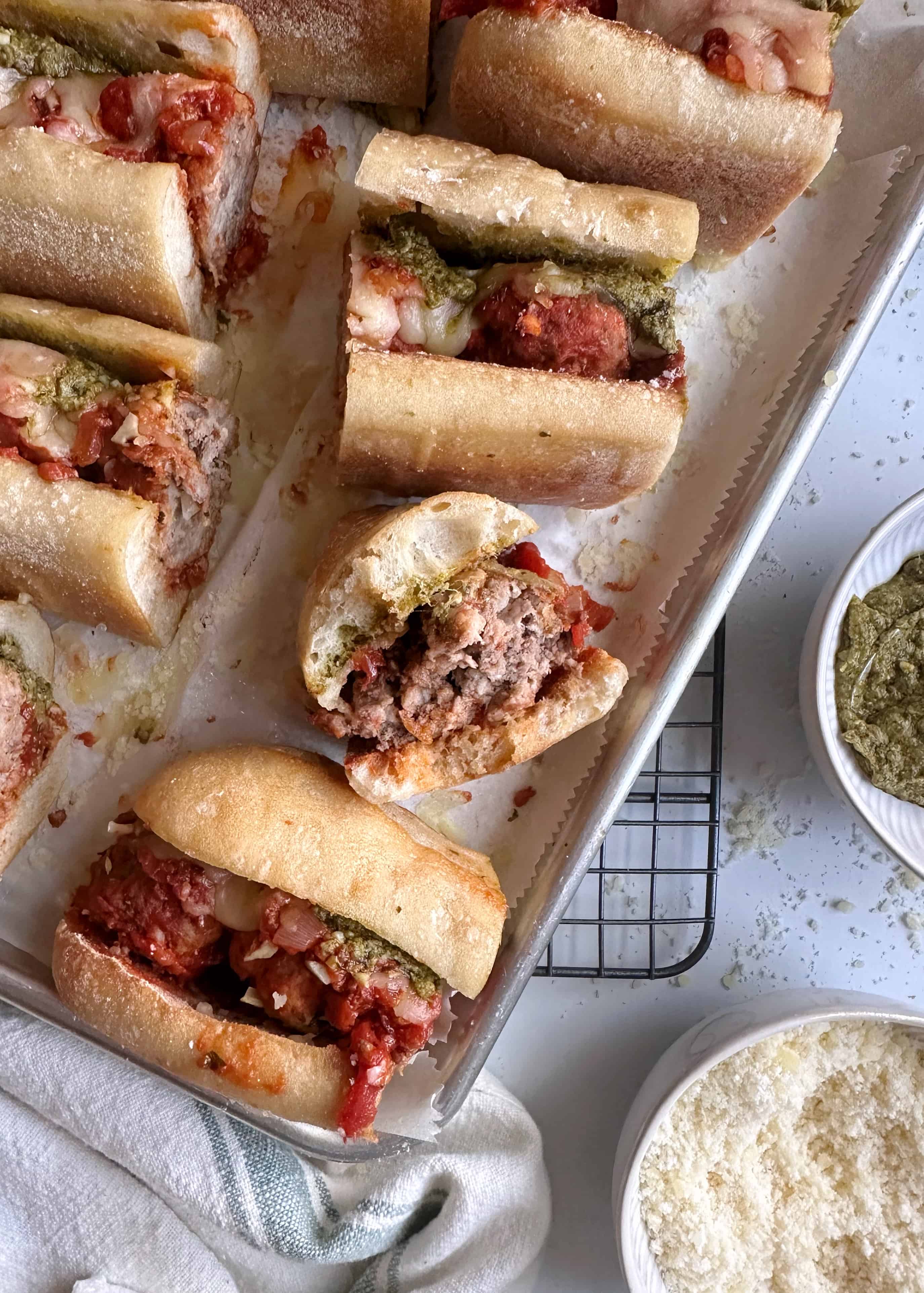 individual meatball subs with one bite taken out
