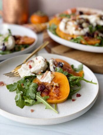 Persimmon Salad with Burrata, Dried Cranberries, Bacon, and Walnuts