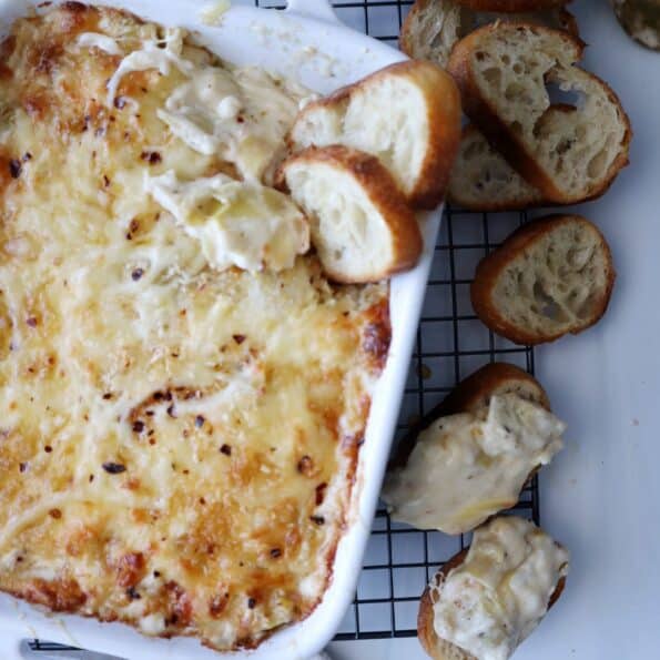 Cheesy Artichoke Dip with Hot Honey Drizzle