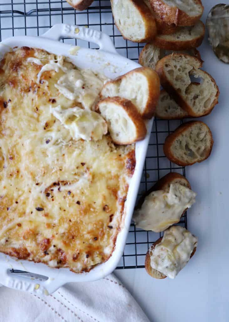 Cheesy Artichoke Dip with Hot Honey Drizzle