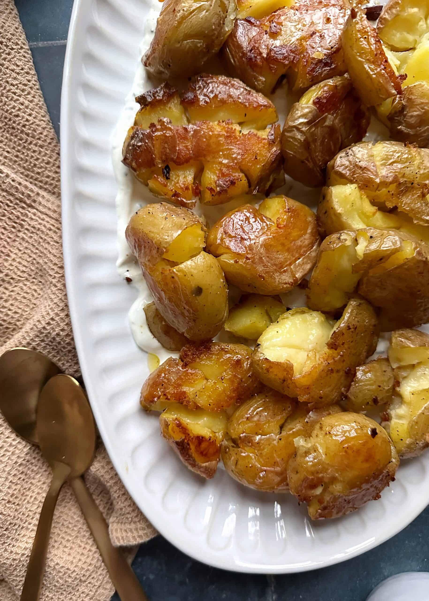 Crispy Garlicky Smashed Potatoes with Chive Dipping Sauce