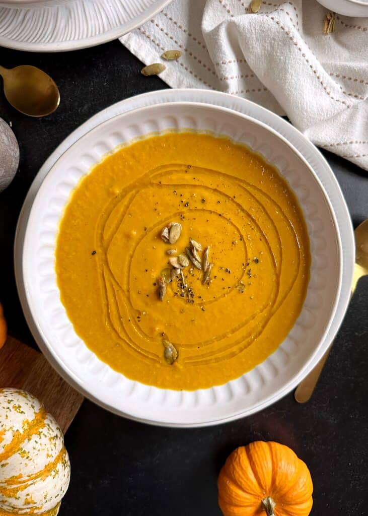 Curry Carrot Pumpkin Soup with Caramelized Maple Pumpkin Seeds