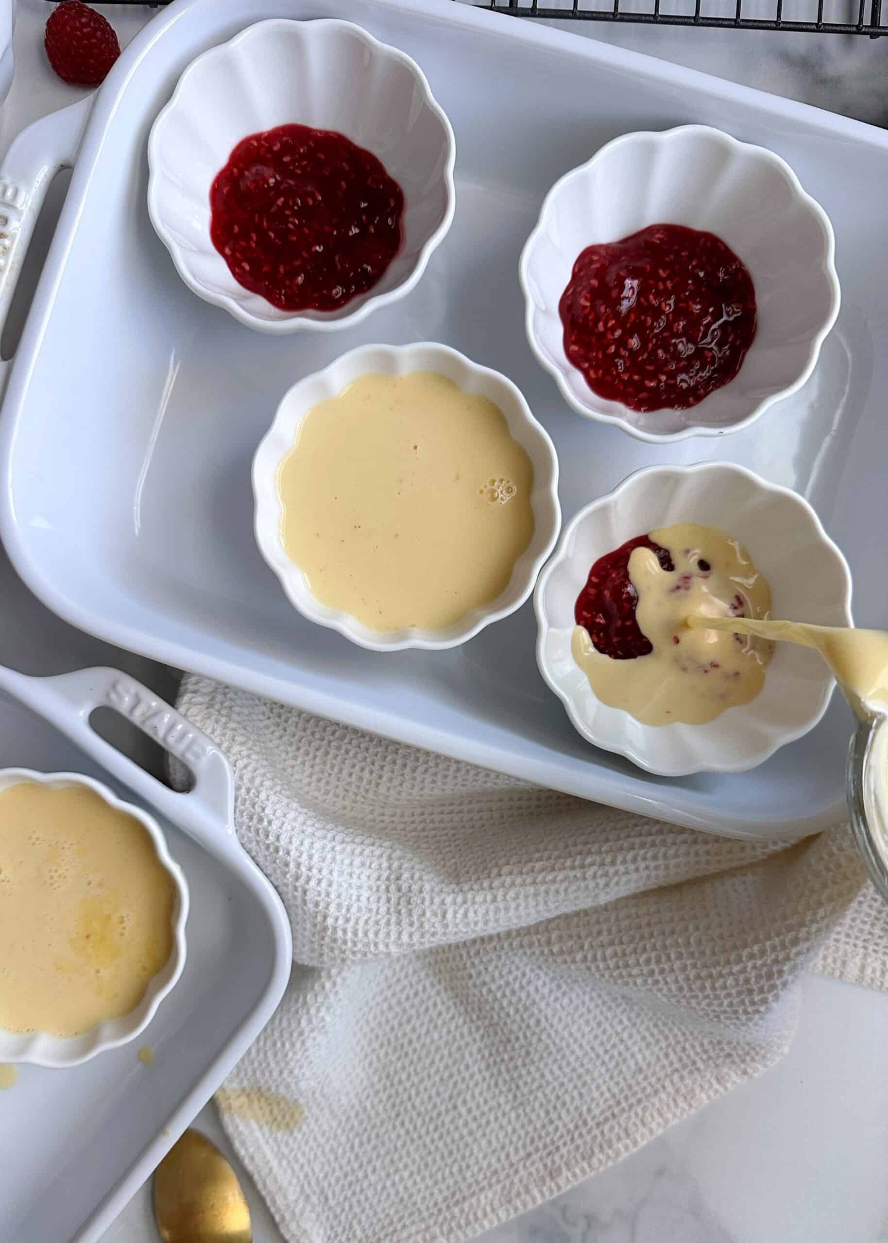 pouring custard into ramekins for creme brulee