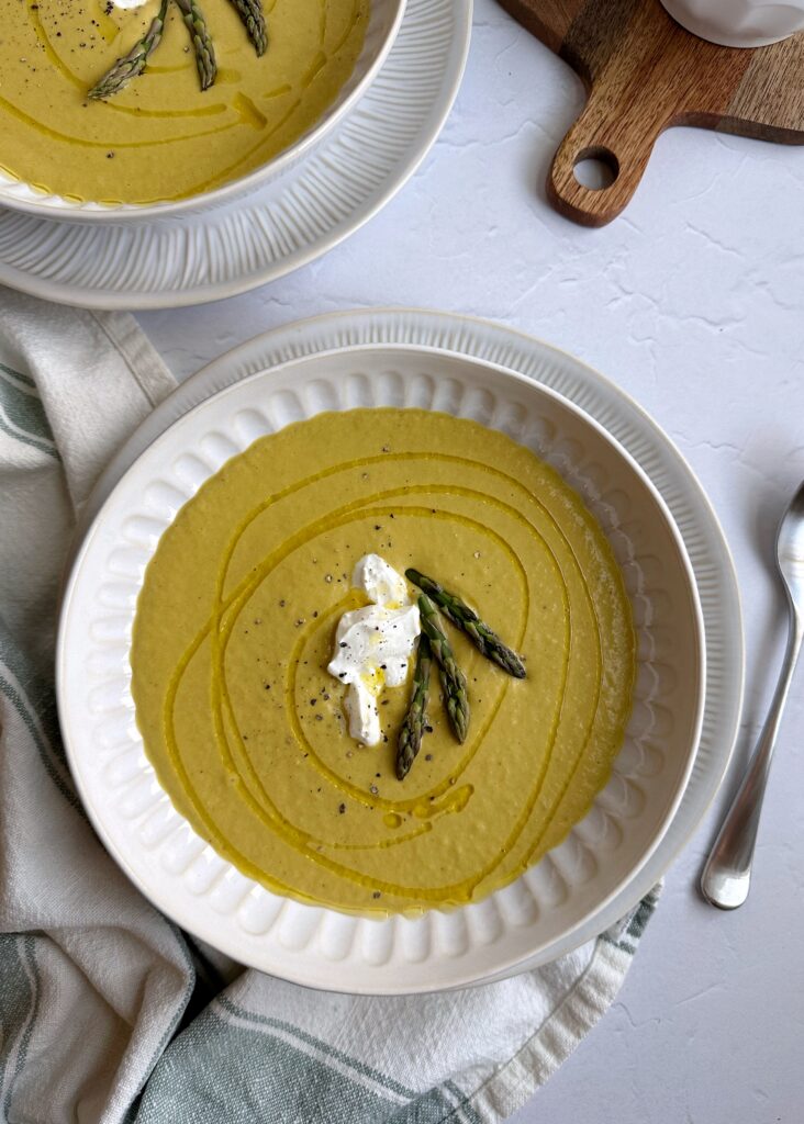 chilled asparugus soup with greek yogurt and asparagus top garnish