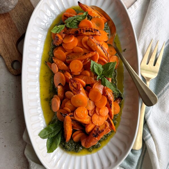 raw and roasted carrot salad with carrot top pesto