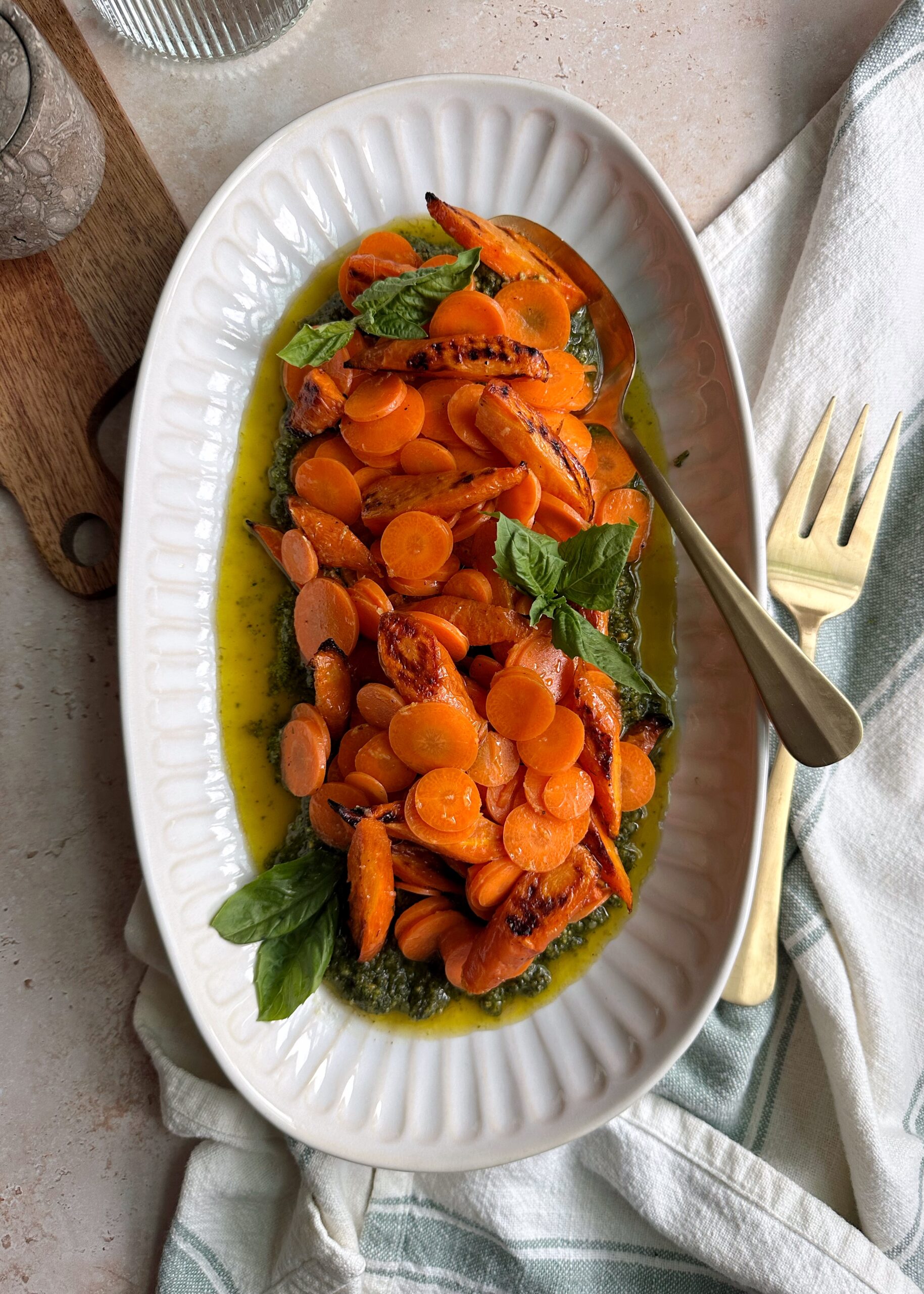 raw and roasted carrot salad with carrot top pesto