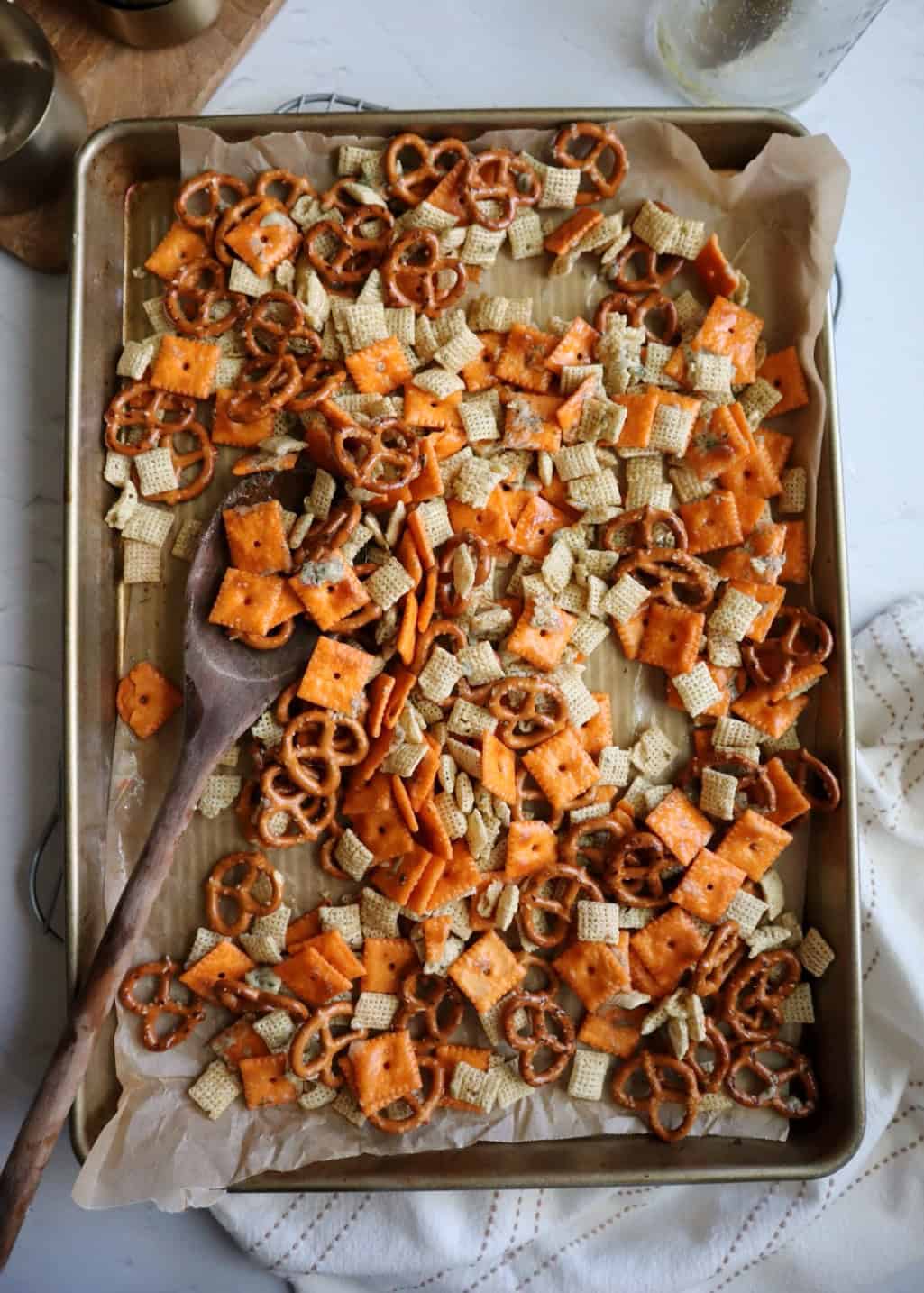 ranch snack mix before baking on a baking tray