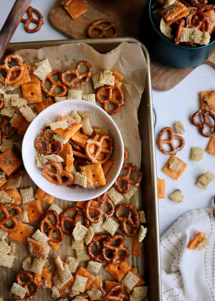 ranch snack mix in bowls on a silver tray