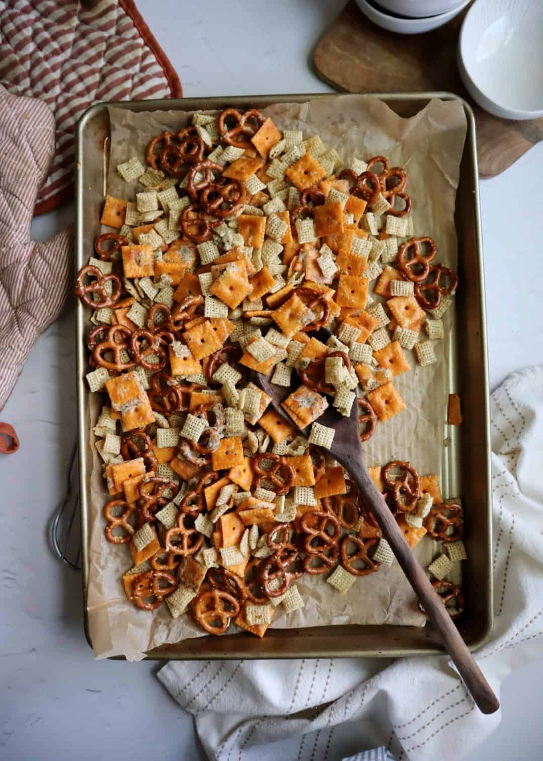 ranch snack mix on a baking tray out of the oven