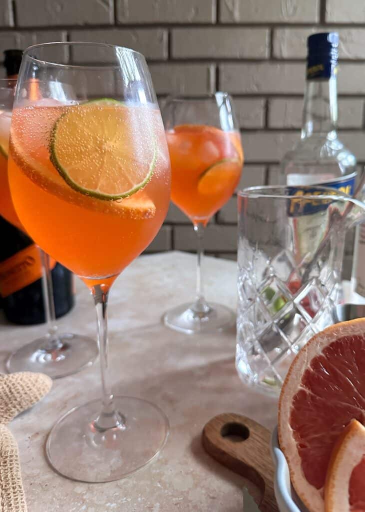 aperol paloma spritz in a wine glass