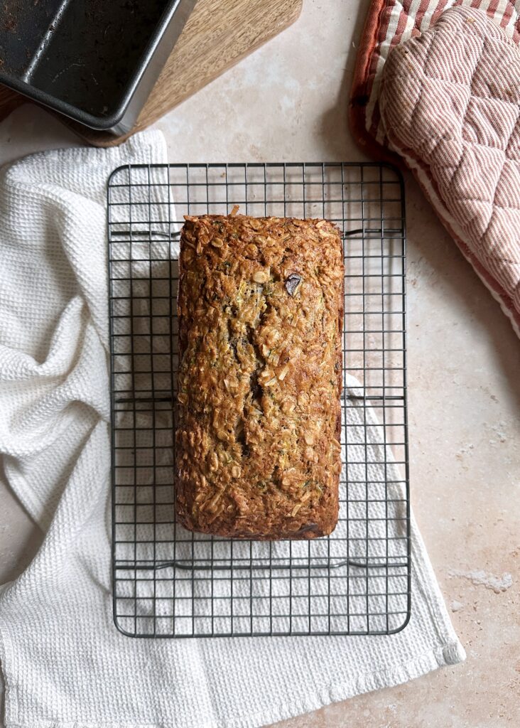 zucchini bread loaf on a cooling rack