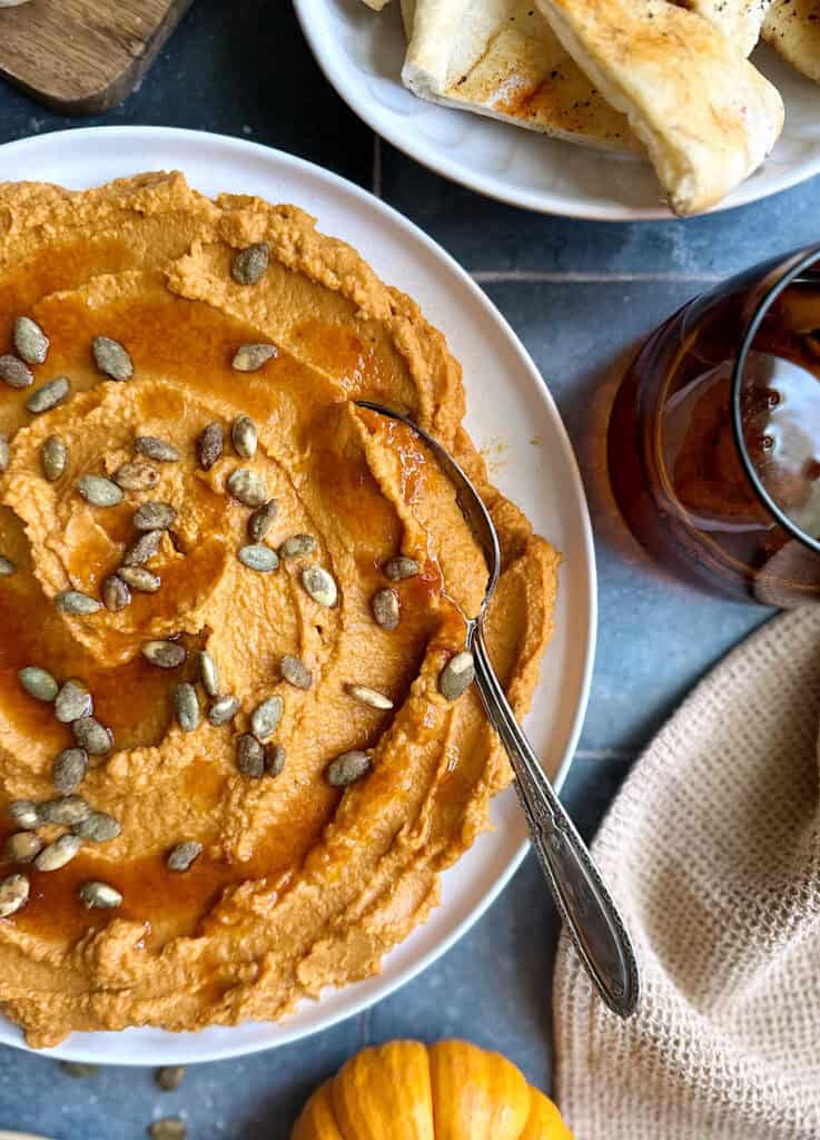 pumpkin hummus with toasted pumpkin seed garnish