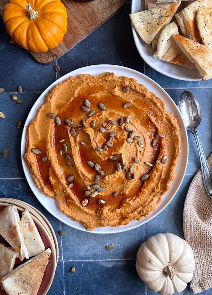 sweet and smoky pumpkin hummus with toasted pumpkin seed garnish