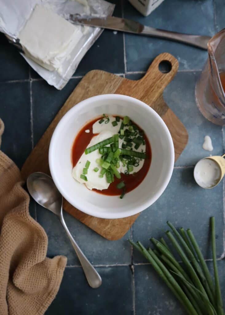 buffalo cream cheese mixture in white bowl