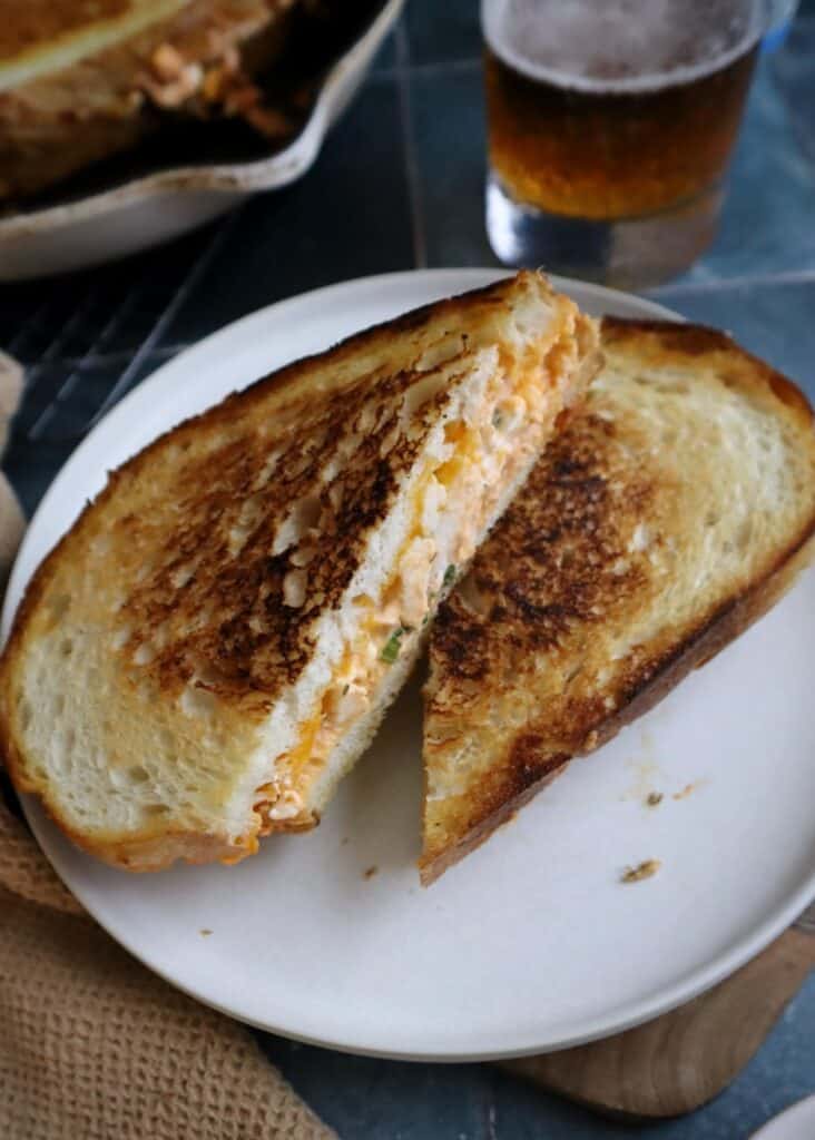 spicy buffalo chicken grilled cheese on a white plate