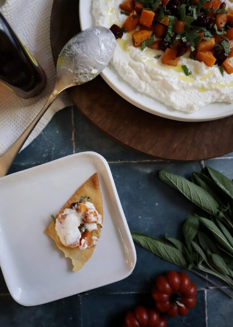 sauteed persimmons and ricotta on a cracker