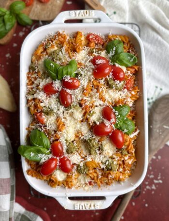 baked christmas pasta with cherry tomatoes and fresh parmesan cheese