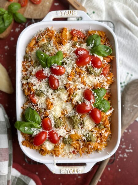 baked christmas pasta with cherry tomatoes and fresh parmesan cheese