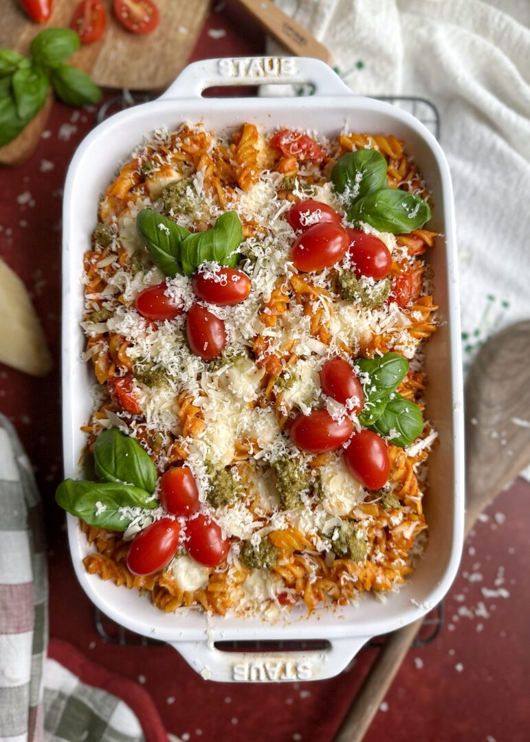 baked christmas pasta with cherry tomatoes and fresh parmesan cheese