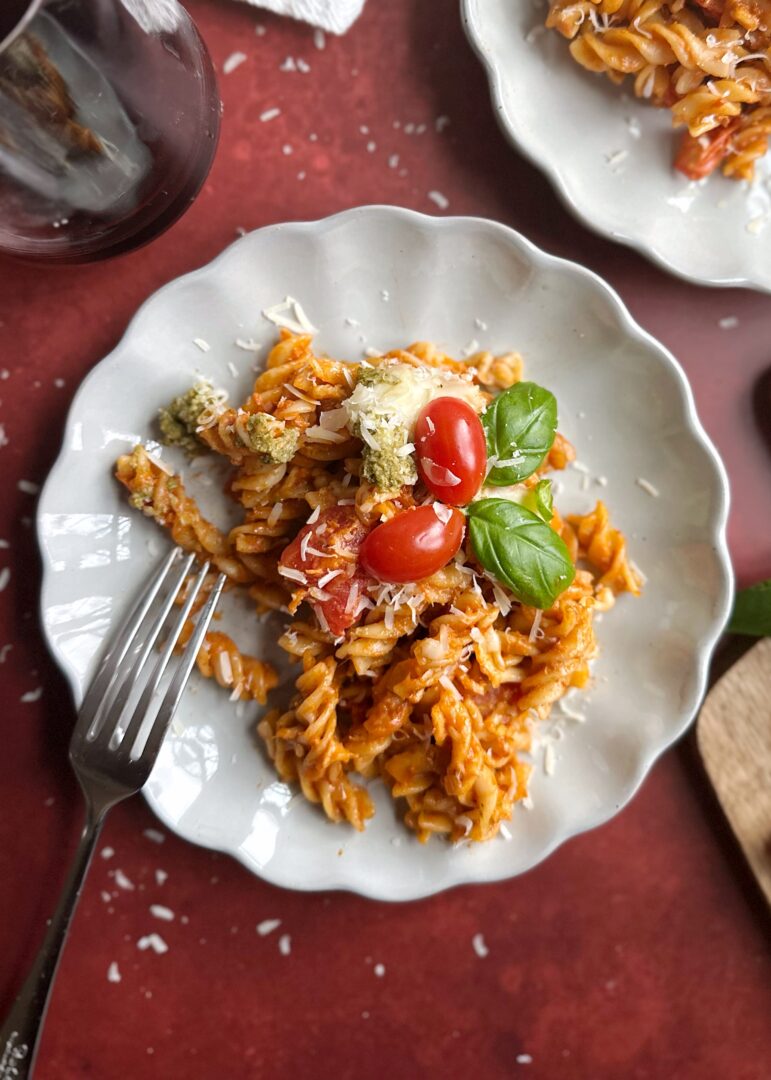 plate of baked christmas pasta with cherry tomatoes