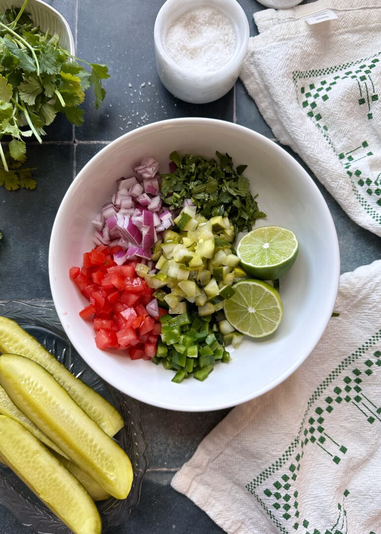 chopped ingredients in a bowl for pico de gallo