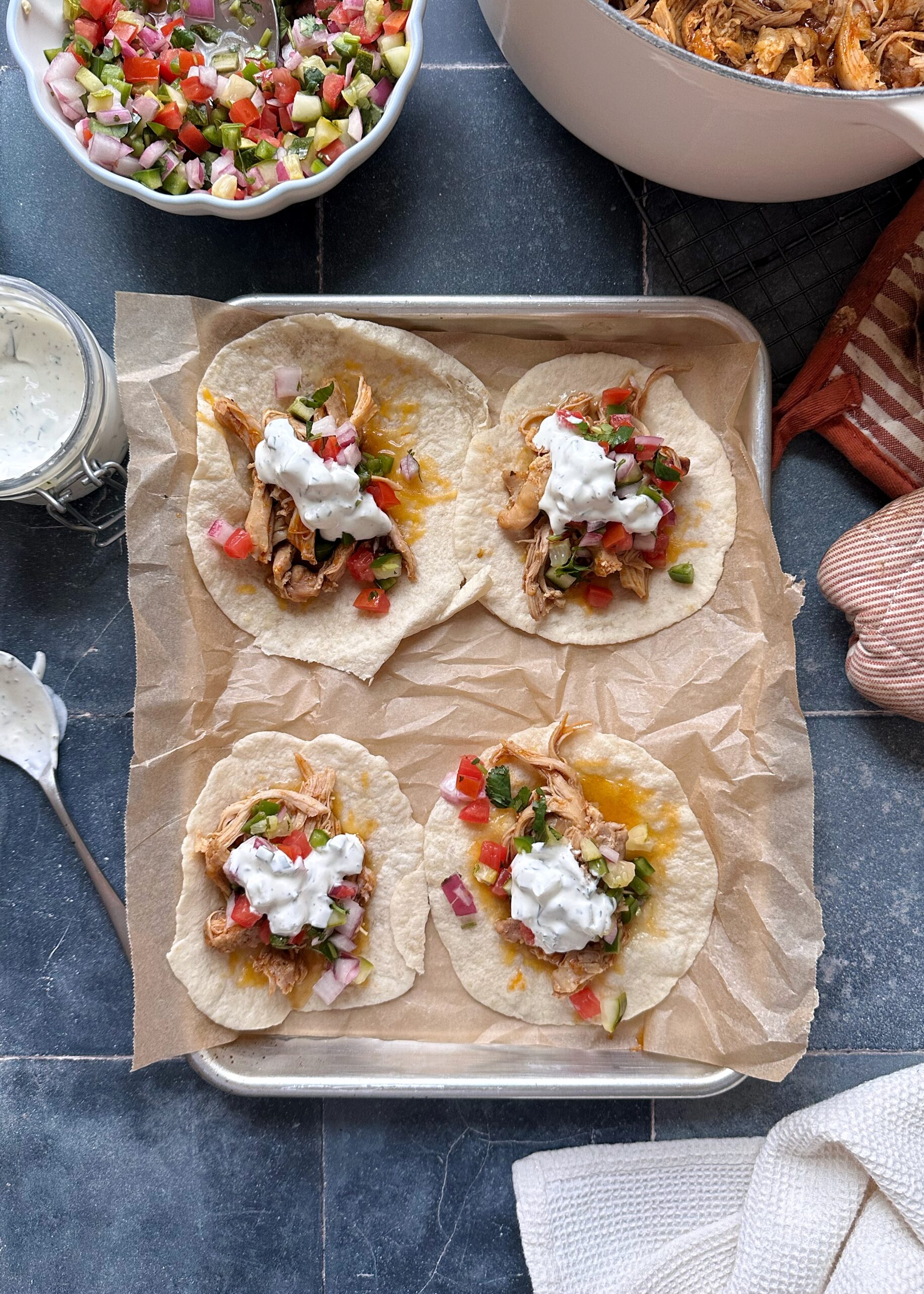 tray of pulled chicken tacos with pickle de gallo