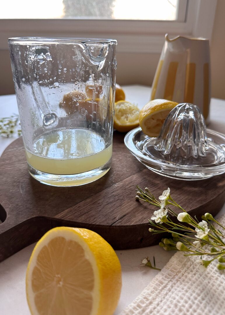 fresh squeezed lemon juice in glass pitcher