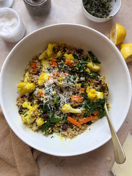 roasted winter vegetable grain salad in serving bowl