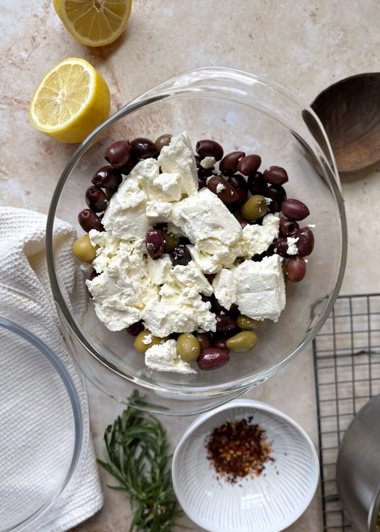 glass bowl of feta and mixed olives