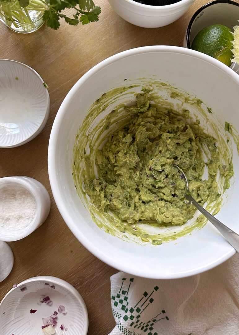 mixing super simple guacamole
