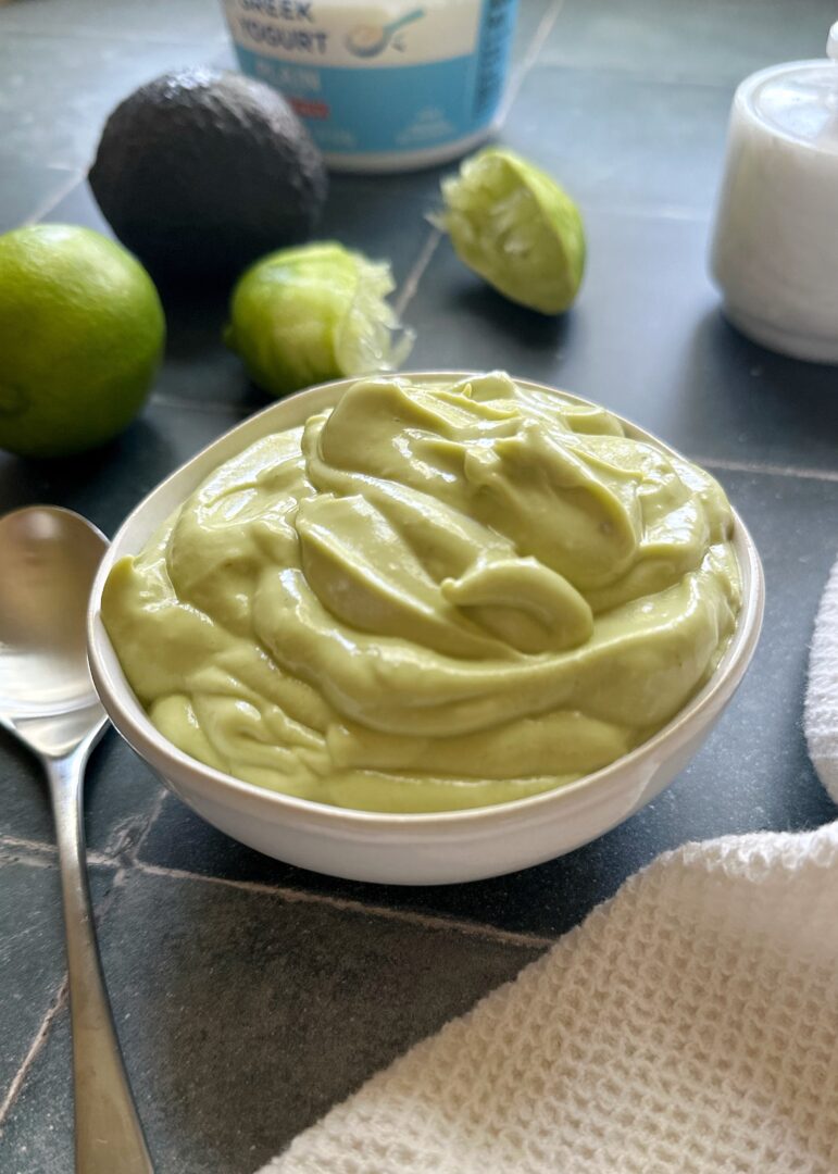 avocado crema in white bowl