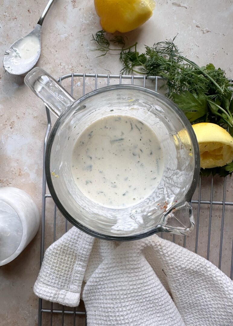 lemon ranch dressing in glass pitcher