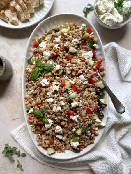 greek farro salad with feta and fresh herb garnish