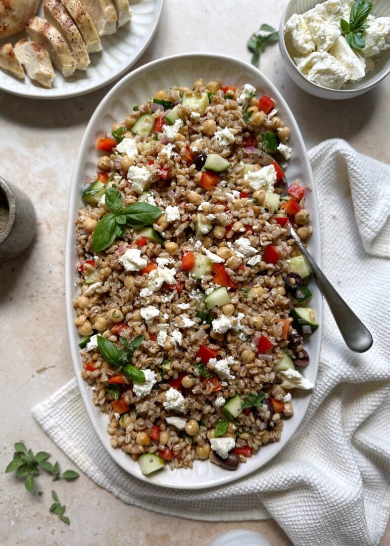 greek farro salad with feta and fresh herb garnish