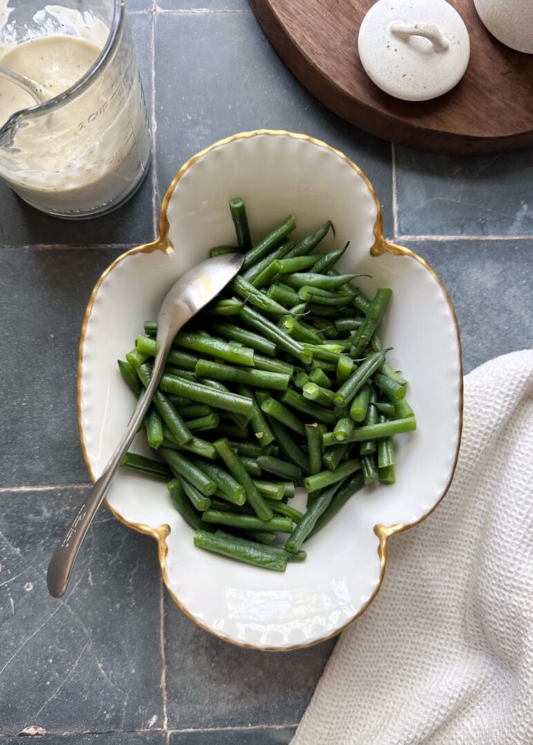 steamed green beans with caesar dressing on the side