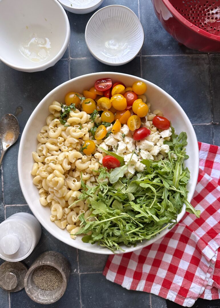 tomato lovers pasta salad ingredients in mixing bowl