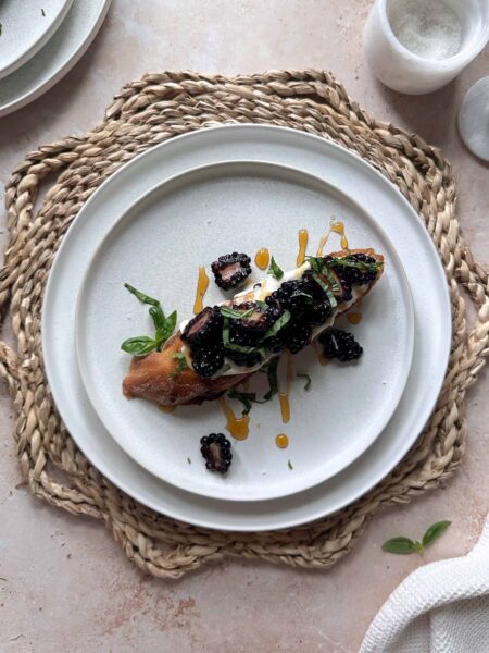 whipped ricotta and blackberry toast with honey and fresh basil