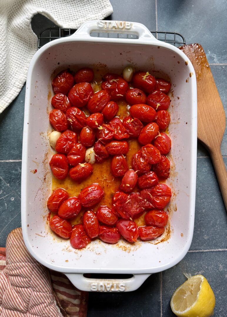 burst tomatoes in a casserole dish