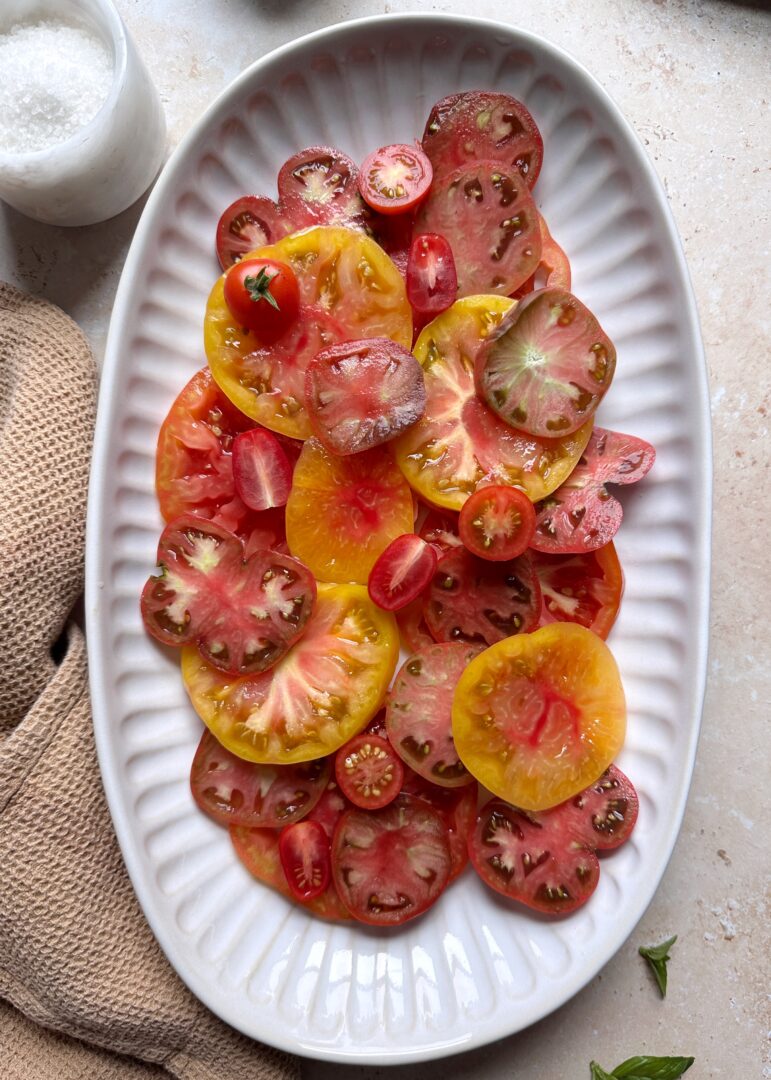 plate of mixed sliced tomatoes