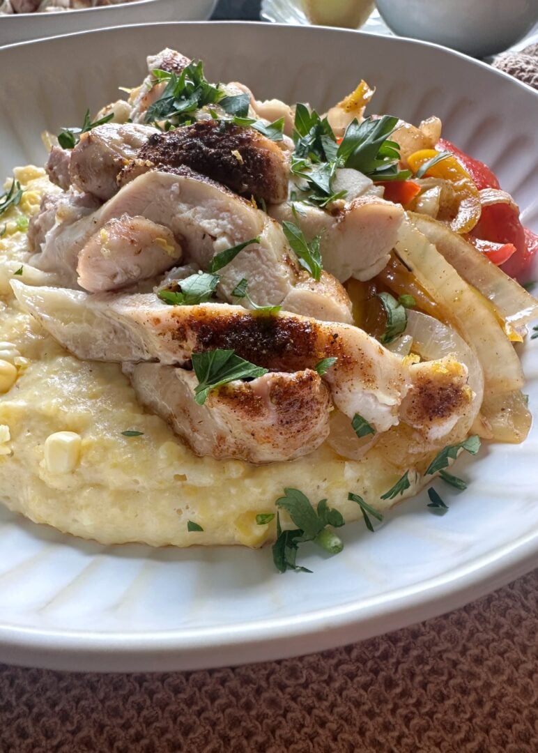 Cajun chicken and peppers with creamy polenta