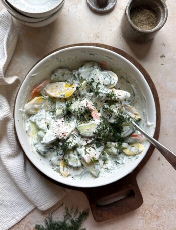 bowl of carrot and cucumber salad with greek yogurt dressing