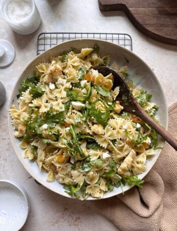 bowl of pasta salad with cauliflower olives and apricots