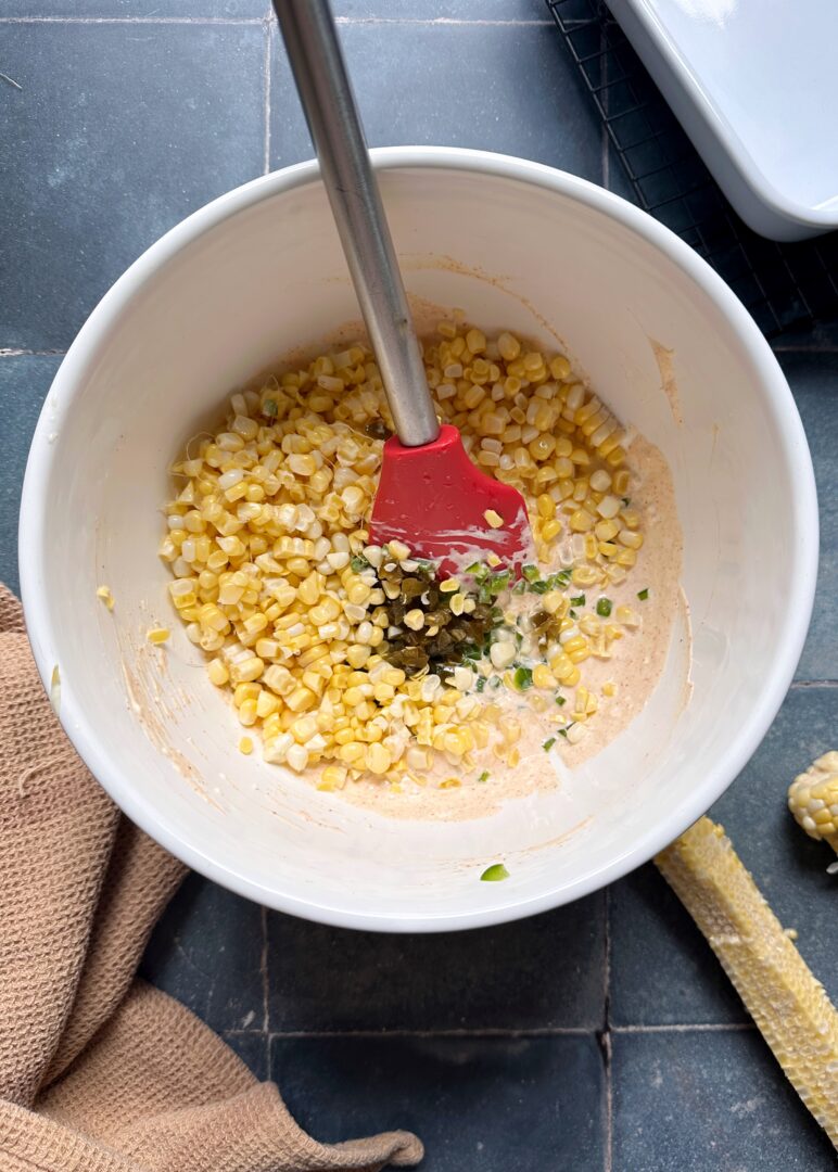 elote dip ingredients in mixing bowl