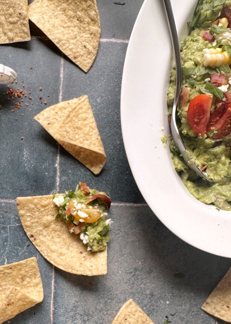 loaded guacamole on a tortilla chip