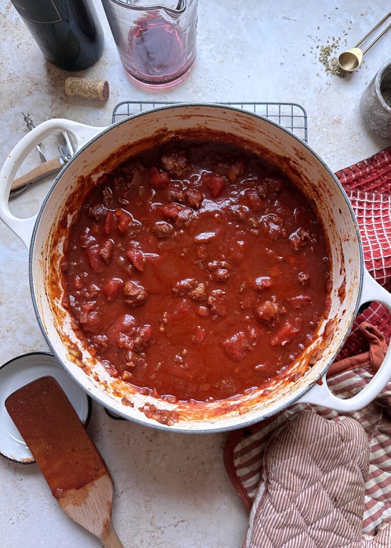 beef and sausage bolognese in large dutch oven